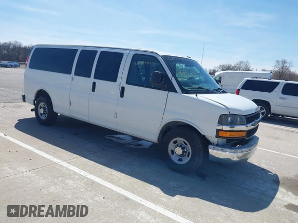 2015 Chevrolet Express Passenger LT z VIN 1GAZG1FGXF1186123, wystawiony jako IAAI lot #42023980 z przebiegiem 74 532 mil mil oraz . Historia ofert i sprzedaży dostępna na DreamBid. Obrazek 1.