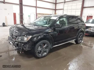 2019 Dodge Journey Crossroad with VIN 3C4PDCGG4KT857726, listed as a IAAI auction lot 41871156 with 96,953 mi miles. Bid and sale history available at carsss.com. Image 2.