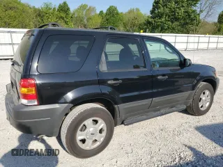 2003 Ford Escape XLT Popular with VIN 1FMYU03163KC66848, listed as a Copart auction lot 53102465 with 79,158 mi miles and Salvage title. Bid and sale history available at DreamBid. Image 3.
