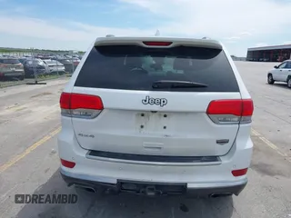 2014 Jeep Grand Cherokee Summit with VIN 1C4RJFJG0EC174871, listed as a IAAI auction lot 42341312 with 170,743 mi miles and . Bid and sale history available at DreamBid. Image 19.