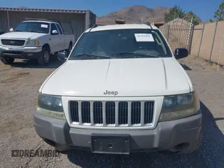 2004 Jeep Grand Cherokee Laredo with VIN 1J4GX48SX4C151160, listed as a IAAI auction lot 42765441 with 176,179 mi miles and . Bid and sale history available at DreamBid. Image 6.