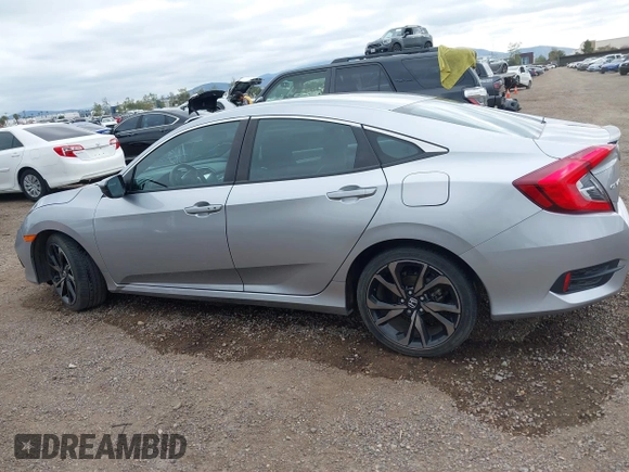 2021 Honda Civic Sport with VIN 2HGFC2F83MH510243, listed as a IAAI auction lot 41856857 with 95,739 mi miles and . Bid and sale history available at DreamBid. Image 14.