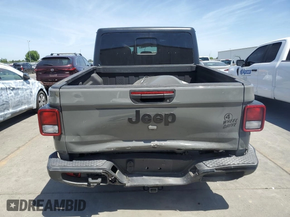 2023 Jeep Gladiator Sport S with VIN 1C6HJTAG3PL552959, listed as a Copart auction lot 56905635 with 30,356 mi miles and Salvage title. Bid and sale history available at DreamBid. Image 6.