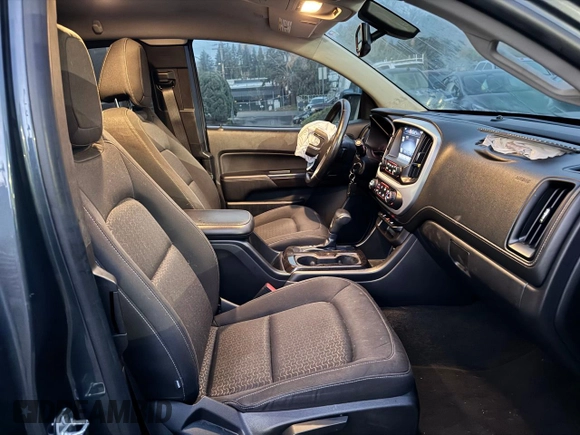 2015 GMC Canyon 2WD SLE with VIN 1GTH5BEA3F1138233, listed as a Copart auction lot 83715314 with 71,254 mi miles and Clean Title. Bid and sale history available at carsss.com. Image 5.