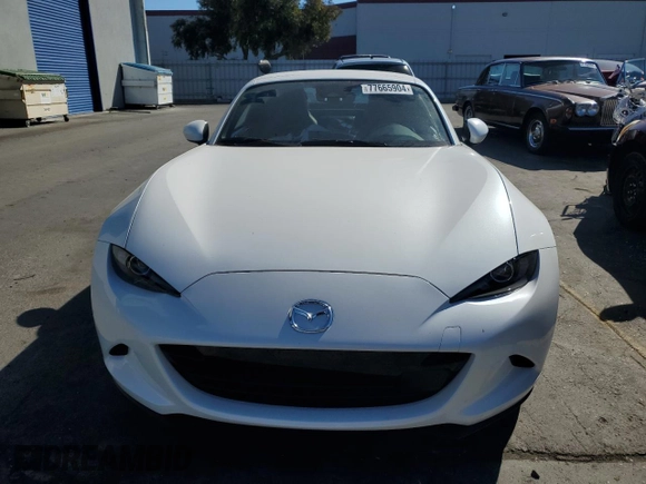 2024 Mazda MX-5 Miata Grand Touring z VIN JM1NDAM76R0602972, wystawiony jako Copart lot #77665904 z przebiegiem 4 965 mil mil oraz Szkoda całkowita • Salvage title. Historia ofert i sprzedaży dostępna na DreamBid. Obrazek 5.