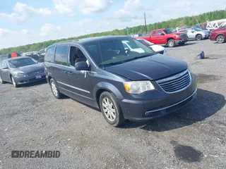 2014 Chrysler Town & Country Touring with VIN 2C4RC1BG0ER461081, listed as a IAAI auction lot 42157023 with 220,955 mi miles. Bid and sale history available at carsss.com. Image 1.
