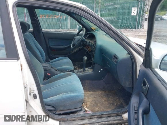 1992 Toyota Camry LE z VIN 4T1SK12E0NU021654, wystawiony jako IAAI lot #42305378 z przebiegiem 305 421 mil mil oraz . Historia ofert i sprzedaży dostępna na DreamBid. Obrazek 5.