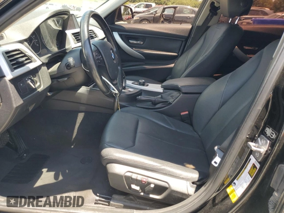2013 BMW 3 Series 328i with VIN WBA3A5C57DF602652, listed as a Copart auction lot 60874345 with 147,214 mi miles and Salvage title. Bid and sale history available at DreamBid. Image 7.
