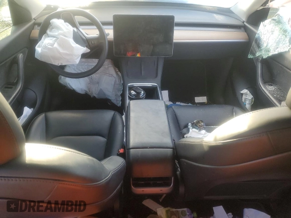 2022 Tesla Model Y Performance with VIN 7SAYGDEFXNF381791, listed as a Copart auction lot 88215705 with 60,153 mi miles and Salvage title. Bid and sale history available at DreamBid. Image 8.