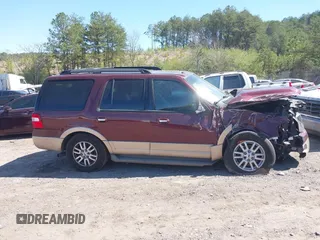 2011 Ford Expedition XLT with VIN 1FMJU1H50BEF30677, listed as a IAAI auction lot 41853877 with 155,105 mi miles and . Bid and sale history available at DreamBid. Image 13.