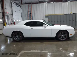 2013 Dodge Challenger SXT with VIN 2C3CDYAG8DH554016, listed as a IAAI auction lot 41275678 with 55,826 mi miles. Bid and sale history available at carsss.com. Image 13.