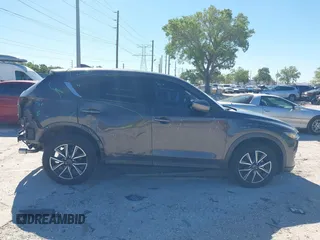 2018 Mazda CX-5 Grand Touring with VIN JM3KFBDM8J0314925, listed as a IAAI auction lot 41825917 with 70,027 mi miles. Bid and sale history available at carsss.com. Image 14.