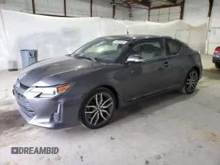 2016 Scion tC z VIN JTKJF5C75GJ022789, wystawiony jako Copart lot #54305435 z przebiegiem 49 007 mil mil oraz Szkody całkowita. Historia ofert i sprzedaży dostępna na DreamBid. Obrazek 1.
