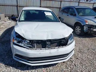 2016 Volkswagen Jetta Sedan 1.4T S w/Technology with VIN 3VW267AJ5GM249423, listed as a IAAI auction lot 41867790 with 61,979 mi miles. Bid and sale history available at carsss.com. Image 6.