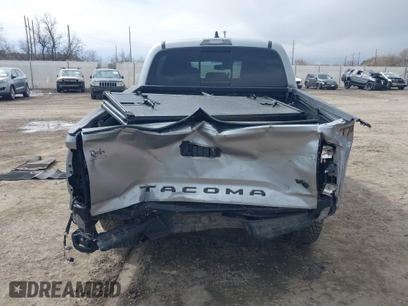 2023 Toyota Tacoma 4WD SR with VIN 3TMCZ5AN0PM609672, listed as a IAAI auction lot 41830191 with 24,244 mi miles. Bid and sale history available at carsss.com. Image 16.