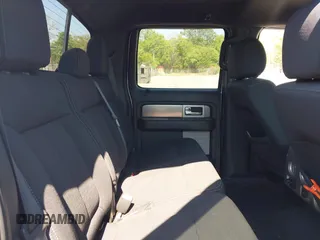 2013 Ford F-150 XL with VIN 1FTFW1ET0DFC85741, listed as a IAAI auction lot 42022221 with 156,509 mi miles. Bid and sale history available at carsss.com. Image 8.