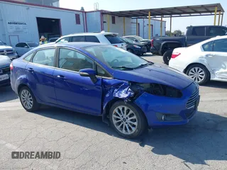 2014 Ford Fiesta SE z VIN 3FADP4BJ3EM171510, wystawiony jako IAAI lot #42380354 z przebiegiem 134 682 mil mil oraz . Historia ofert i sprzedaży dostępna na DreamBid. Obrazek 1.