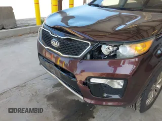 2011 Kia Sorento SX with VIN 5XYKWDA23BG120760, listed as a IAAI auction lot 42111403 with 119,666 mi miles. Bid and sale history available at carsss.com. Image 12.