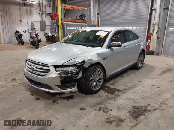 2013 Ford Taurus Limited with VIN 1FAHP2F83DG116657, listed as a IAAI auction lot 41533075 with 124,649 mi miles. Bid and sale history available at carsss.com. Image 2.