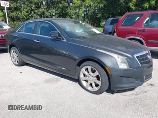 2014 Cadillac ATS Standard AWD z VIN 1G6AG5RX9E0173779, wystawiony jako IAAI lot #42301228 z przebiegiem 102 293 mil mil oraz . Historia ofert i sprzedaży dostępna na DreamBid. Obrazek 1.