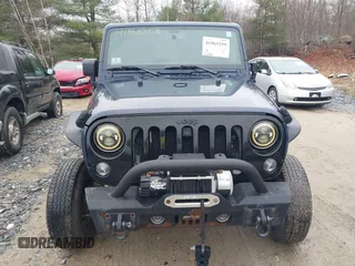 2013 Jeep Wrangler Rubicon 10th Anniversary with VIN 1C4BJWCG7DL544145, listed as a IAAI auction lot 41965259 with 125,900 mi miles and . Bid and sale history available at carsss.com. Image 13.
