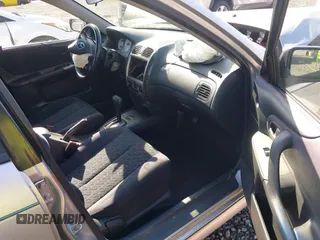 2002 Mazda Protege z VIN JM1BJ246221493337, wystawiony jako IAAI lot #42171966 z przebiegiem 244 609 mil mil oraz . Historia ofert i sprzedaży dostępna na DreamBid. Obrazek 5.