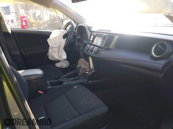2014 Toyota RAV4 LE with VIN JTMBFREV9E5030687, listed as a IAAI auction lot 41095249 with 53,726 mi miles and . Bid and sale history available at DreamBid. Image 5.