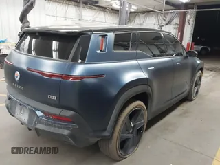 2023 Fisker Ocean One z VIN VCF1ZBU25PG003706, wystawiony jako IAAI lot #41906422 z przebiegiem Nie podano mil oraz . Historia ofert i sprzedaży dostępna na DreamBid. Obrazek 4.
