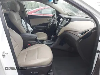 2018 Hyundai Santa Fe Ultimate with VIN 5NMZW4LA3JH088349, listed as a IAAI auction lot 42168983 with 66,884 mi miles and . Bid and sale history available at DreamBid. Image 5.