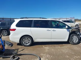 2015 Toyota Sienna XLE with VIN 5TDYK3DC7FS661582, listed as a IAAI auction lot 41688972 with 145,953 mi miles. Bid and sale history available at carsss.com. Image 14.