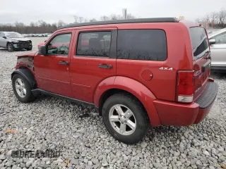 2009 Dodge Nitro SXT with VIN 1D8GU28K69W522292, listed as a Copart auction lot 84890274 with 121,311 mi miles and Salvage Title. Bid and sale history available at carsss.com. Image 2.