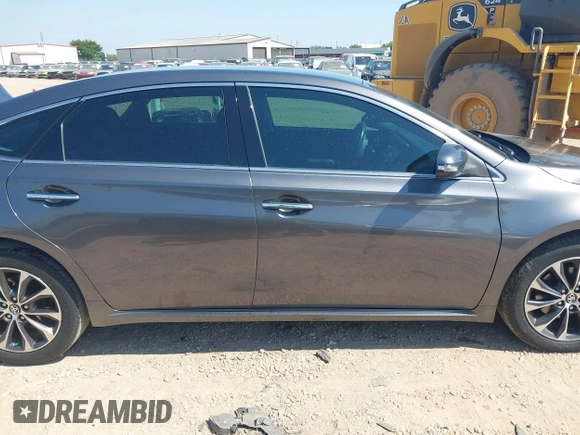 2018 Toyota Avalon XLE with VIN 4T1BK1EB1JU285770, listed as a IAAI auction lot 42073553 with 71,809 mi miles and . Bid and sale history available at DreamBid. Image 13.