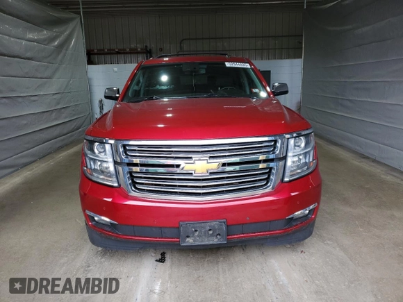 2015 Chevrolet Suburban LTZ with VIN 1GNSKKKC7FR299567, listed as a Copart auction lot 52944035 with 147,964 mi miles and Salvage Title. Bid and sale history available at DreamBid. Image 5.