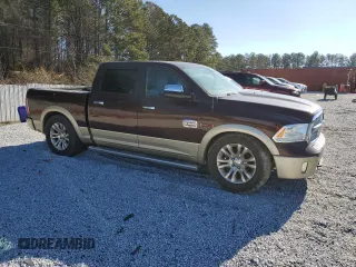 2014 Ram 1500 Longhorn with VIN 1C6RR7PM3ES387807, listed as a Copart auction lot 41520535 with 131,705 mi miles and Clean title. Bid and sale history available at DreamBid. Image 4.