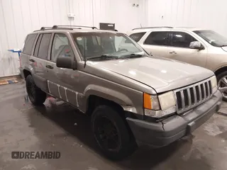 1998 Jeep Grand Cherokee Laredo with VIN 1J4GZ58S3WC343555, listed as a IAAI auction lot 41528943 with 219,146 mi miles. Bid and sale history available at carsss.com. Image 6.