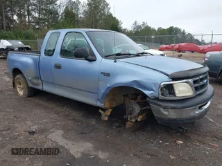1997 Ford F-150 XL with VIN 1FTDX0721VKA67349, listed as a IAAI auction lot 41119214 with 134,096 mi miles and . Bid and sale history available at DreamBid. Image 1.