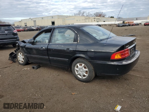 2001 Kia Optima LX z VIN KNAGD126315028712, wystawiony jako Copart lot #85302564 z przebiegiem 81 722 mil mil oraz Nie do naprawy • Non repairable. Historia ofert i sprzedaży dostępna na DreamBid. Obrazek 2.