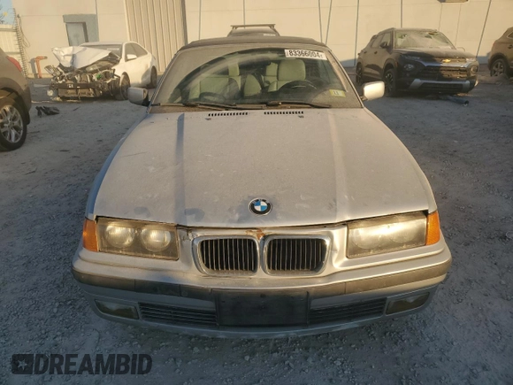 1998 BMW 3 Series z VIN WBABK8330WEY89818, wystawiony jako Copart lot #41557015 z przebiegiem 253 522 mil mil oraz Nie do naprawy • Non repairable. Historia ofert i sprzedaży dostępna na DreamBid. Obrazek 5.