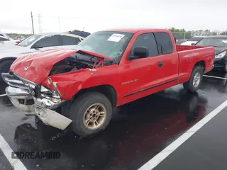 1999 Dodge Dakota SLT z VIN 1B7GL22X3XS155894, wystawiony jako IAAI lot #41938830 z przebiegiem 224 068 mil mil oraz . Historia ofert i sprzedaży dostępna na DreamBid. Obrazek 2.