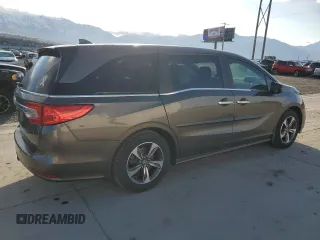 2018 Honda Odyssey Touring с VIN 5FNRL6H8XJB076145, выставлен на аукционе Copart как лот 51870865 с пробегом 96 486 миль миль и Списание • Salvage title. История ставок и продаж доступна на DreamBid. Изображение 3.