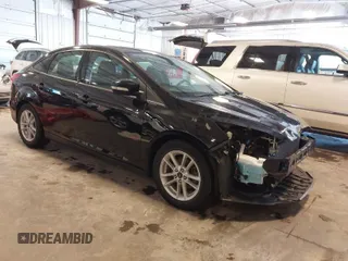2018 Ford Focus SE with VIN 1FADP3F23JL215479, listed as a IAAI auction lot 41936036 with 96,560 mi miles. Bid and sale history available at carsss.com. Image 1.
