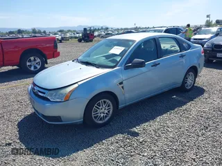 2008 Ford Focus SE z VIN 1FAHP35N58W226540, wystawiony jako IAAI lot #42383245 z przebiegiem 183 312 mil mil oraz . Historia ofert i sprzedaży dostępna na DreamBid. Obrazek 2.