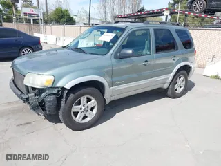 2007 Ford Escape Hybrid with VIN 1FMCU59H37KA92464, listed as a IAAI auction lot 42001479 with 159,147 mi miles. Bid and sale history available at carsss.com. Image 2.