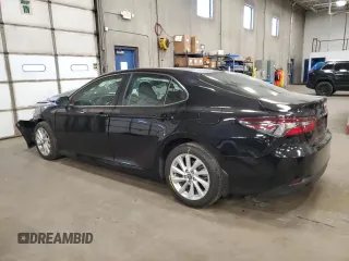 2023 Toyota Camry LE z VIN 4T1R11AK3PU776521, wystawiony jako Copart lot #55927255 z przebiegiem 50 323 mil mil oraz Szkoda całkowita • Salvage title. Historia ofert i sprzedaży dostępna na DreamBid. Obrazek 2.