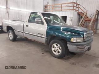 1999 Dodge 1500 z VIN 3B7HC16Y9XM600021, wystawiony jako IAAI lot #42560196 z przebiegiem Nie podano mil oraz . Historia ofert i sprzedaży dostępna na DreamBid. Obrazek 1.