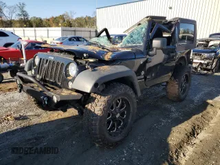 2015 Jeep Wrangler Willys Wheeler with VIN 1C4AJWAG8FL648645, listed as a Copart auction lot 74334884 with Not provided miles and Salvage title. Bid and sale history available at DreamBid. Image 1.