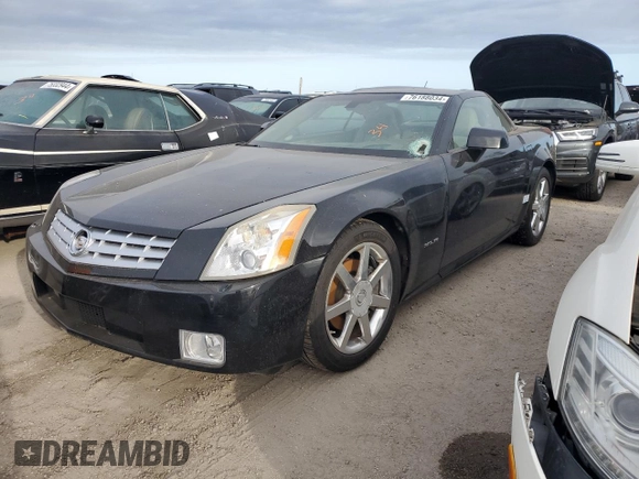 2005 Cadillac XLR z VIN 1G6YV34A955600425, wystawiony jako Copart lot #76188034 z przebiegiem Nie podano mil oraz Szkody całkowita. Historia ofert i sprzedaży dostępna na DreamBid. Obrazek 1.