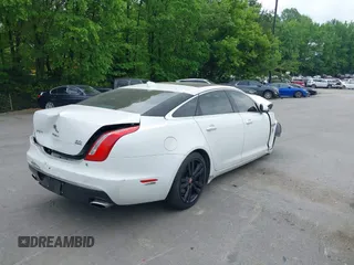 2016 Jaguar XJ Portfolio with VIN SAJWJ2GD8G8W00063, listed as a IAAI auction lot 42076707 with Not provided miles and . Bid and sale history available at DreamBid. Image 4.