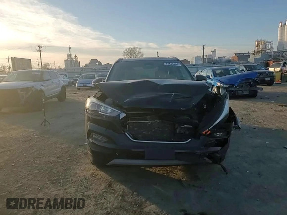 2017 Hyundai Tucson Sport with VIN KM8J3CA25HU572940, listed as a Copart auction lot 87414304 with 56,854 mi miles and Salvage Title. Bid and sale history available at DreamBid. Image 12.