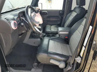 2008 Jeep Wrangler Unlimited Sahara with VIN 1J4GA59178L607960, listed as a Copart auction lot 57855995 with 122,913 mi miles and Salvage title. Bid and sale history available at DreamBid. Image 7.